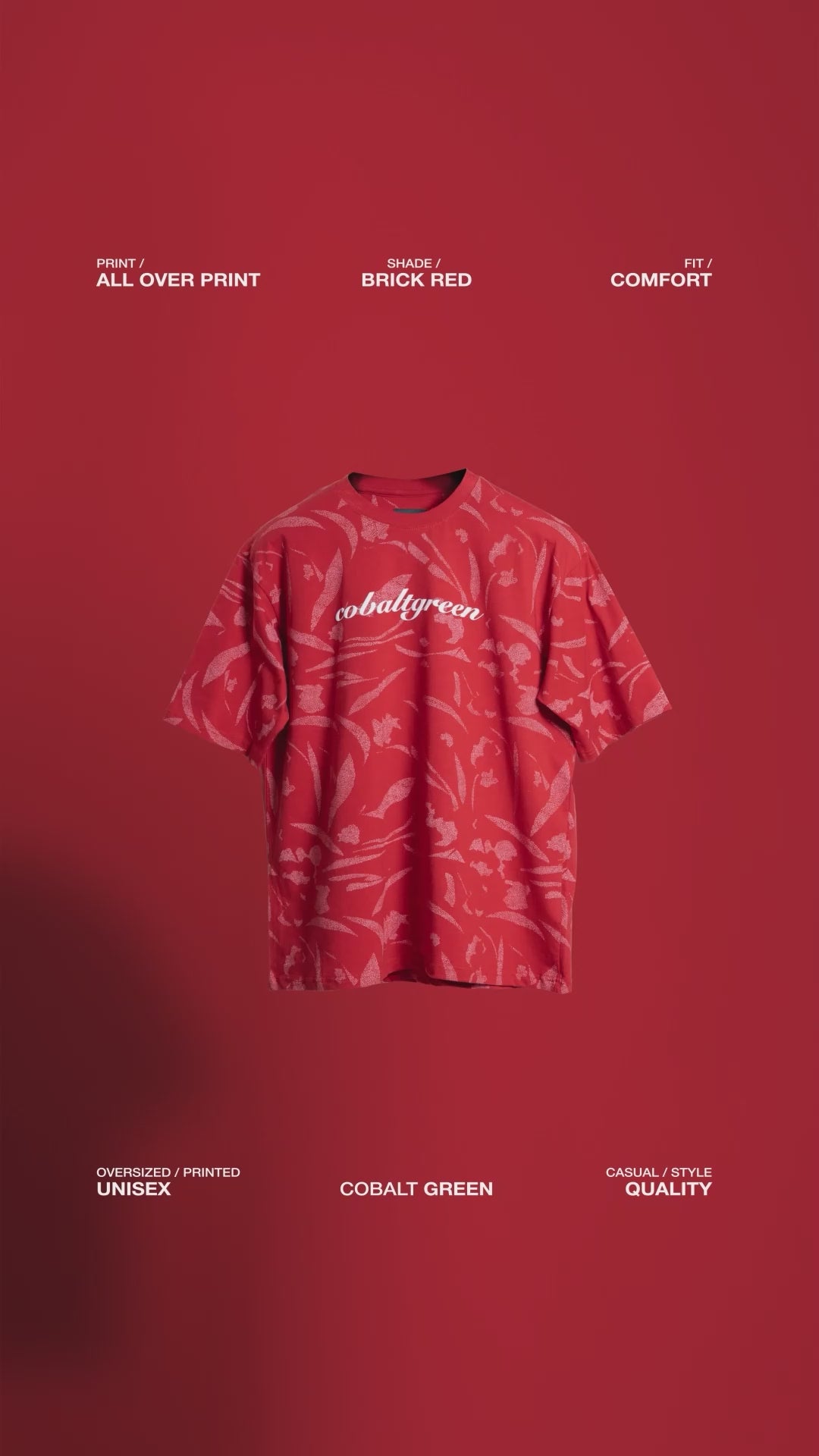 Video of a brick-red oversized t-shirt with an all-over-print design, floating gracefully against an orange background. Text overlays highlight key features: 'Cobalt green' branding on the chest, premium fabric, and relaxed fit. A dynamic showcase emphasizing its unique style and comfort.
